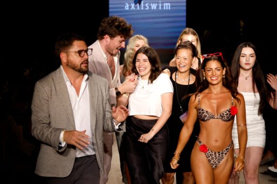MIAMI BEACH, FLORIDA - JUNE 02: Designer Ashley Rainaldo (C) walks the runway at the AXIL Swim Fashion Show during Paraiso Miami Swim Week at The Paraiso Tent on June 02, 2024 in Miami Beach, Florida. (Photo by Frazer Harrison/Getty Images for Axil Swim)