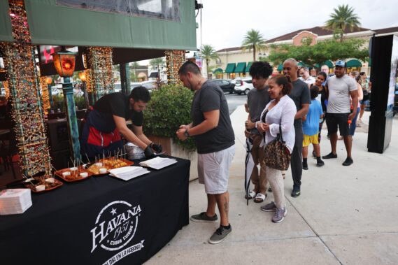 Food enthusiasts explore the offerings at Havana 1957 food stand during the Taste of the Gardens, an event dedicated to raising funds for local charities (Photo courtesy of Shops at Pembroke Gardens)