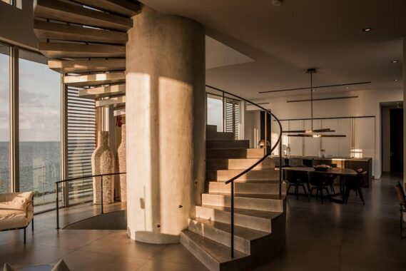 A spiral staircase acts as the "joint" connection of the home's curvature.Photo credit: Ryan Lester, Architecture Sarasota