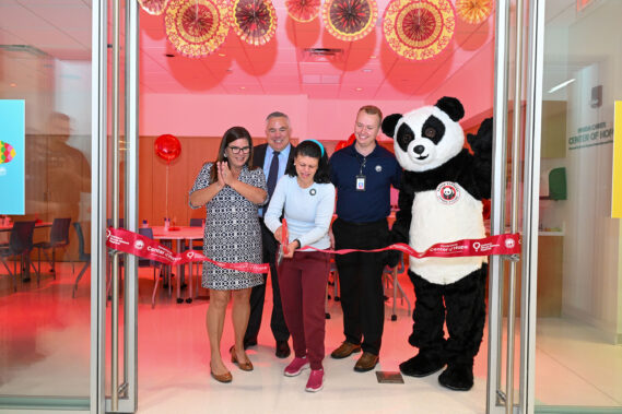 Nicklaus Children's Hospital Foundation President, Allison Baker, Nicklaus Children's Hospital Chief Clinical Operations Officer, Dr. Marcos Mestre, Panda Restaurant Group Area Coach of Operations, McKay Pond, and a Nicklaus Children's patient cut the ribbon alongside Panda Express' Pei Pei at the grand opening of the Nicklaus Children's Panda Cares Center of Hope.