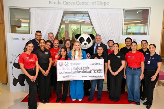 Nicklaus Children's Hospital Foundation President, Allison Baker, and Nicklaus Children's Hospital Chief Clinical Officer, Dr. Marcos Mestre, pose with Children's Miracle Network and Panda Express/Panda Restaurant Group leadership and associates at the grand opening of Nicklaus Children's Panda Cares Center of Hope.