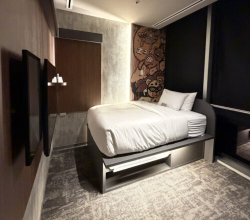 A Wynwood room inside Wait n’ Rest at MIA.