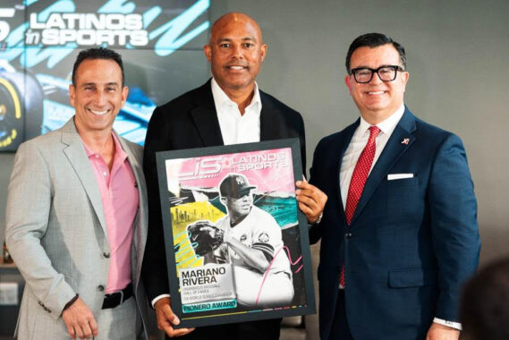 LiS: Latinos in Sports™ co-founders Mike Valdes-Fauli (left) and Xavier A. Gutierrez (right) with Pionero Award recipient and unanimous Baseball Hall of Famer Mariano Rivera (center) at the LiS: Latinos in Sports™ convening in Miami on May 1, 2026. Photo credit: LiS: Latinos in Sports